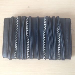 Edgy Chains and Faux Leather Clutch