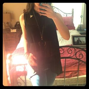 Sheer black top with cowboy detailing