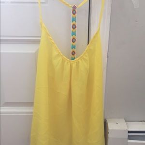 Body central small yellow T-back tank