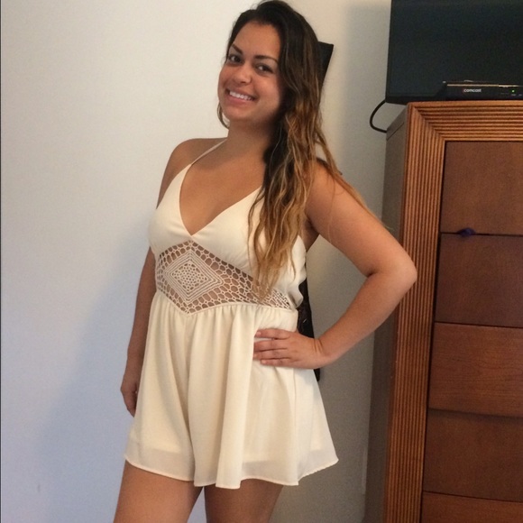 Beautiful baige romper new with tags