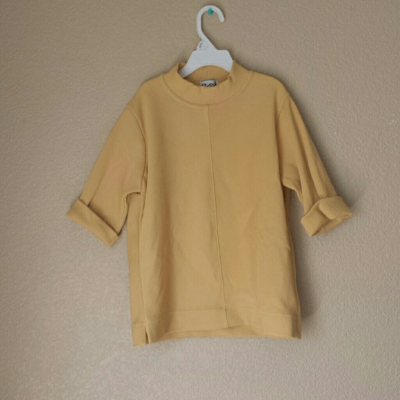 Yellow crop top with a turtle neck