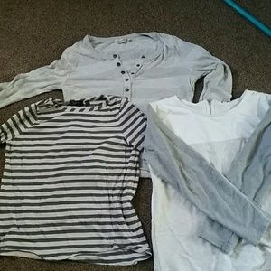 Three grey long sleeve shirts