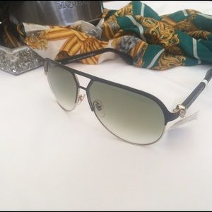 Alexander McQueen matte black and gold sunglasses