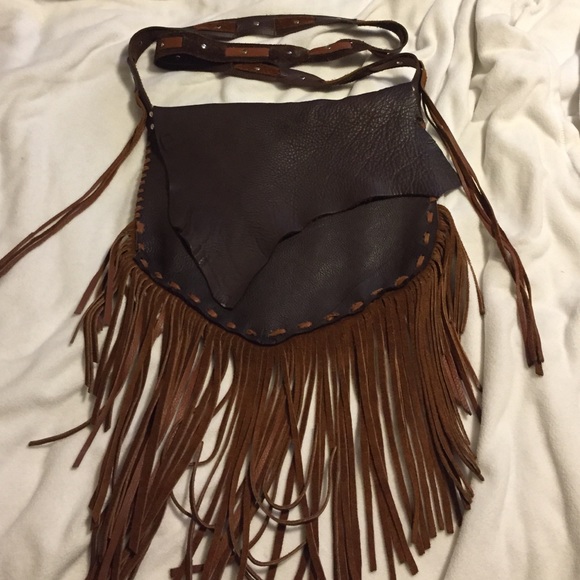Handmade leather cross body bag.