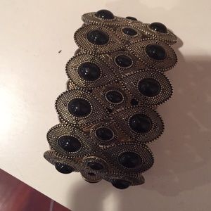 Gold and black bracelet