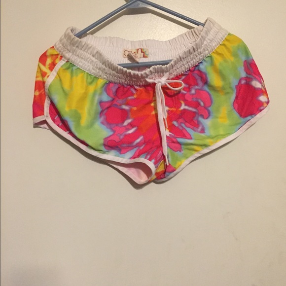 Multicolored swim shorts.