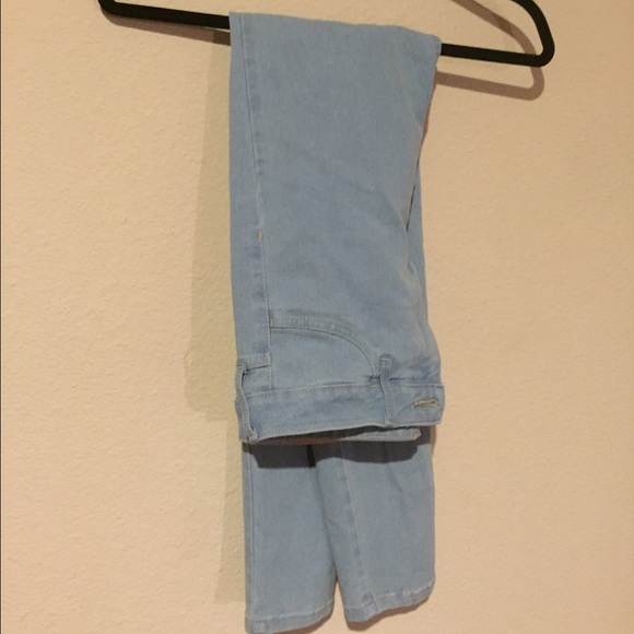 High waisted light blue wash jeans