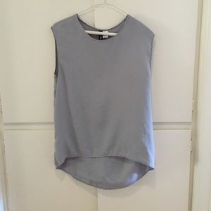 Light blue semi sheer sleeveless blouse