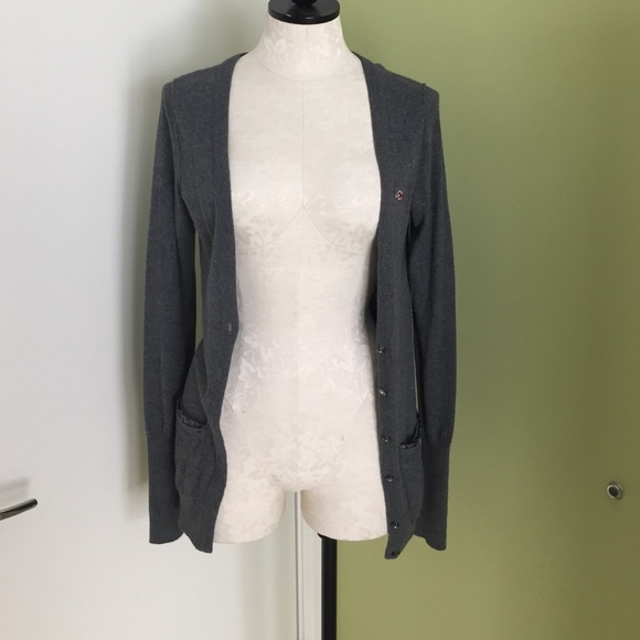 Gray cardigan sweater.