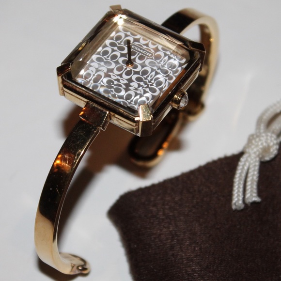 Unique COACH gold watch