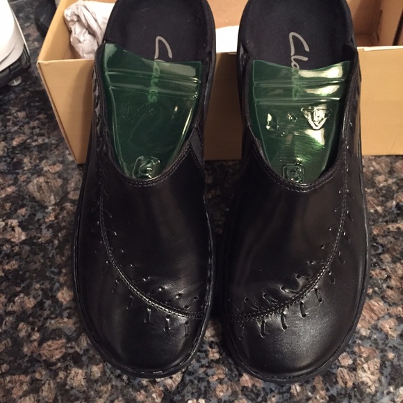 Clarks clogs. Brand new. Size 7