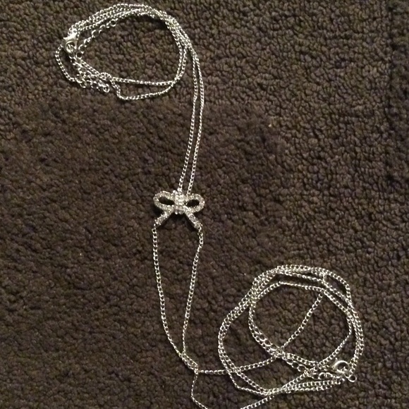 Body chain with rhinestone bow.