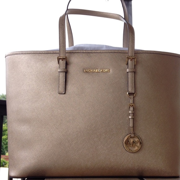 Michael Kors Handbags - Michael Kors Jet Set Tote in gold