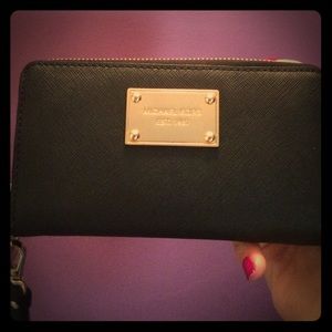 Genuine Michael Kors wallet/phone case/wristlet.