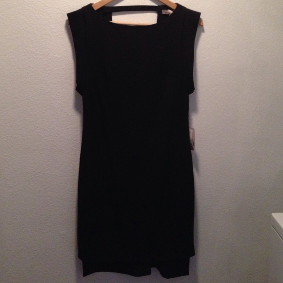 Sleek black dress with low back