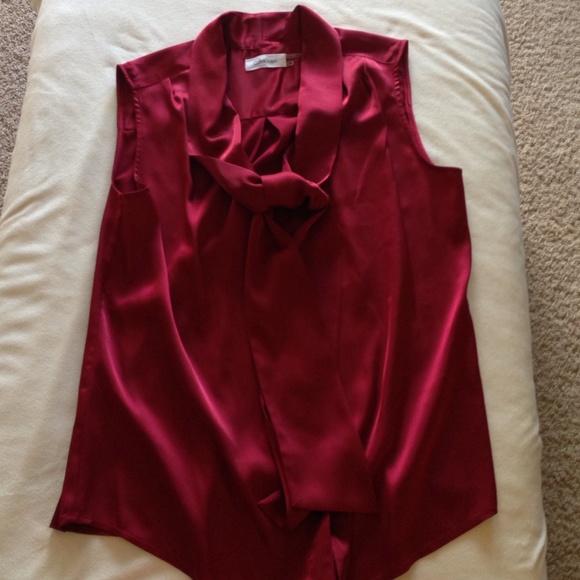 Burgundy Calvin Klein button up sleeveless blouse