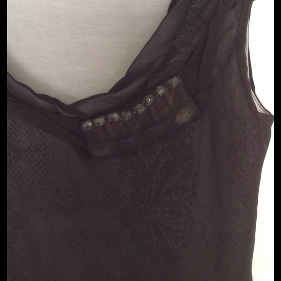 Beautiful black detailed sheer top with lining.