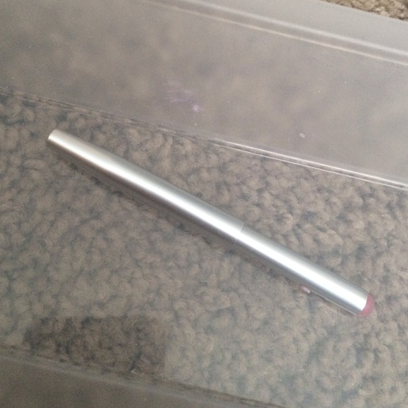 Retractable lip brush