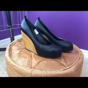 Very Volatile leather and wood wedges