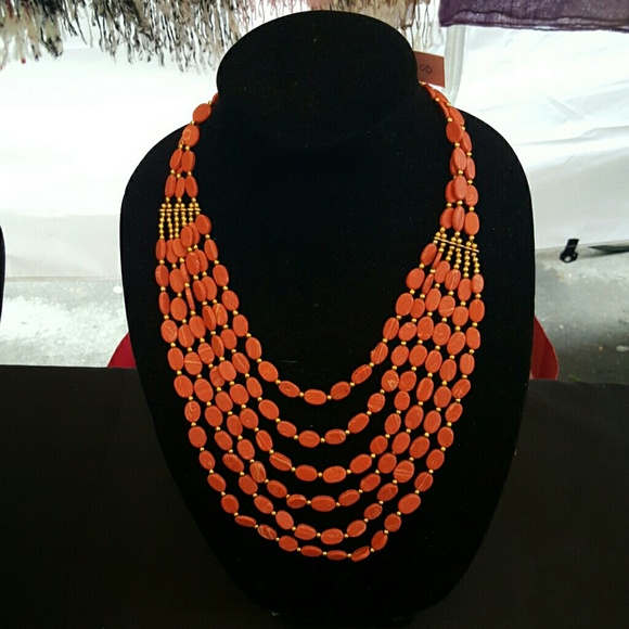 Muilti string red necklace