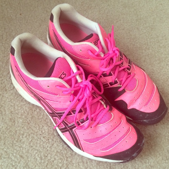 Neon pink Asics sneakers specifically for tennis