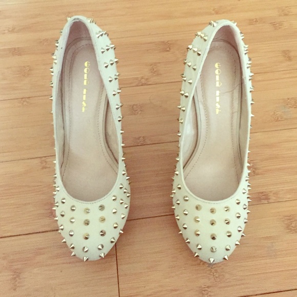 Gold stilettos with spikes