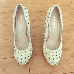 Gold stilettos with spikes