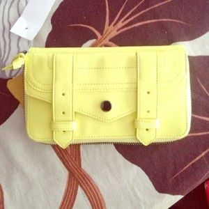 Proenza Schouler lemon yellow full-zip wallet. NEW
