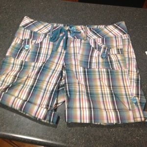Size 13/14 juniors Candies plaid shorts.