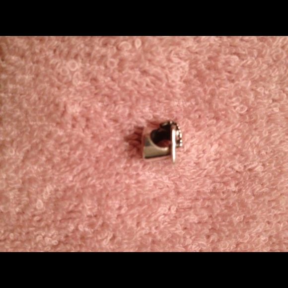 Graduation cap charm.