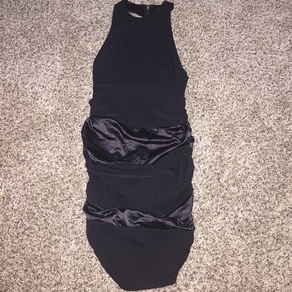 Tight backless black mini dress