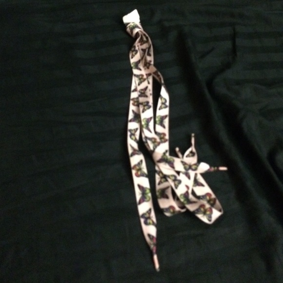 Fat pink butterfly shoe laces