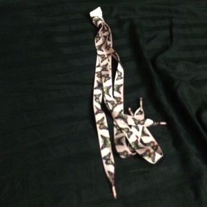 Fat pink butterfly shoe laces