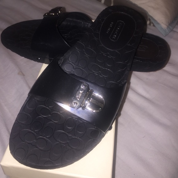 Coach Kasey Poppy Scribble Sandals in black.