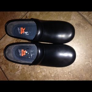 Dansko xp black leather clogs