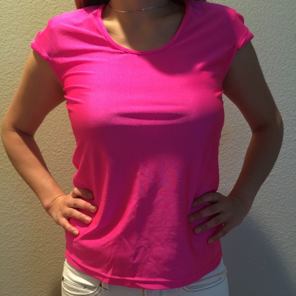 Neon pink top with shoulder pads