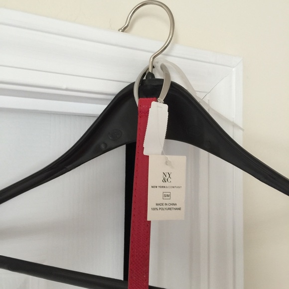 Red patent leather and metal buckle belt