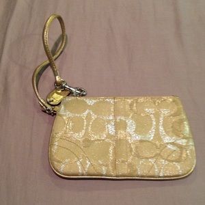 SOLD on EBAY....Coach Gold Glitter Wristlet