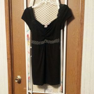 Black top with polka dot waist
