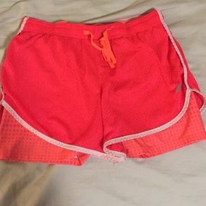 Neon athletic shorts with built in compression