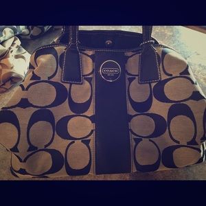 Black canvas coach purse