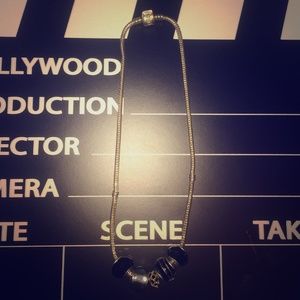 Authentic pandora necklace. With 5 charms.