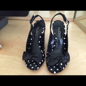 Sold.   Aldo wedged heels