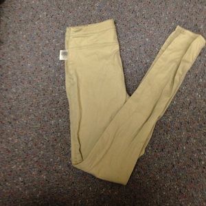 Khaki mid rise side zip pants