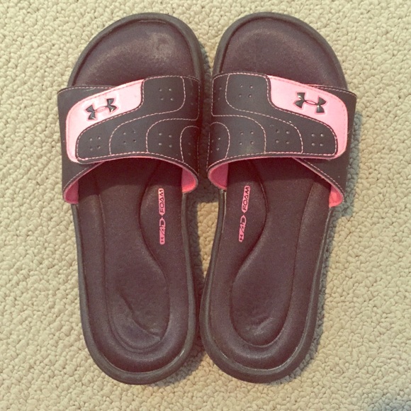 Pink and black under armour slides