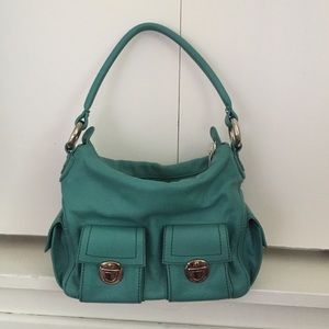 Turquoise MARC JACOBS bag with silver hardware.