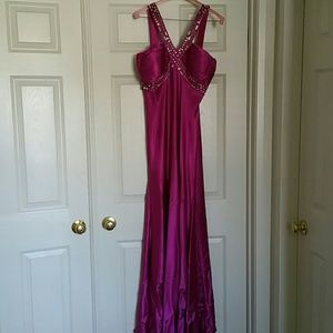 Fushia Formal evening gown with jewel detail.