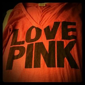 A pink long sleeved shirt