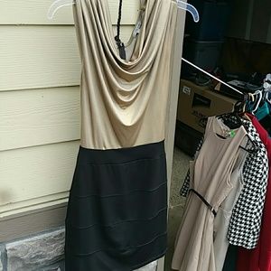 Black and gold dress, flowy top tight bottom