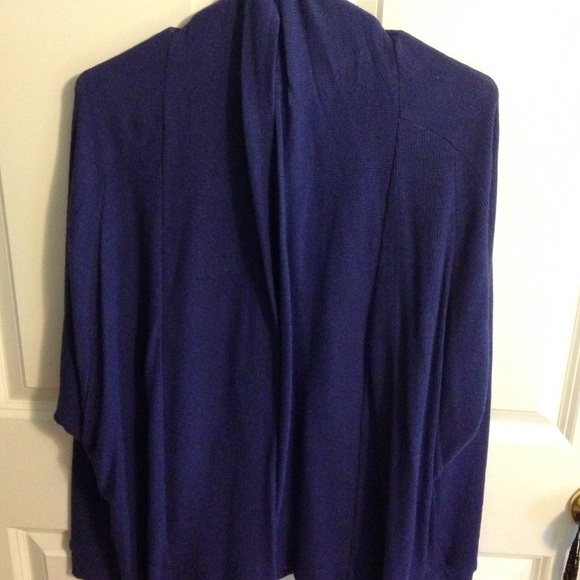 Purple cardigan. Never been worn.
